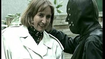 Older german lady slave is fingering herself while her master in latex suit is watching