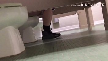 Girls peeing in the bathroom