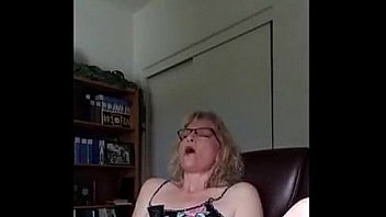 mature milf loves watching porn and masturbating