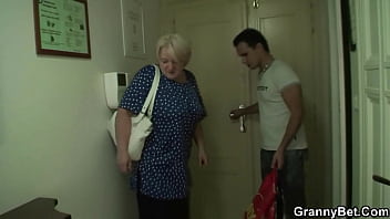 Blonde 70 years old granny rides his cock