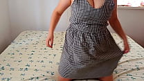 Erotic video of undressing a hot beauty in a dress